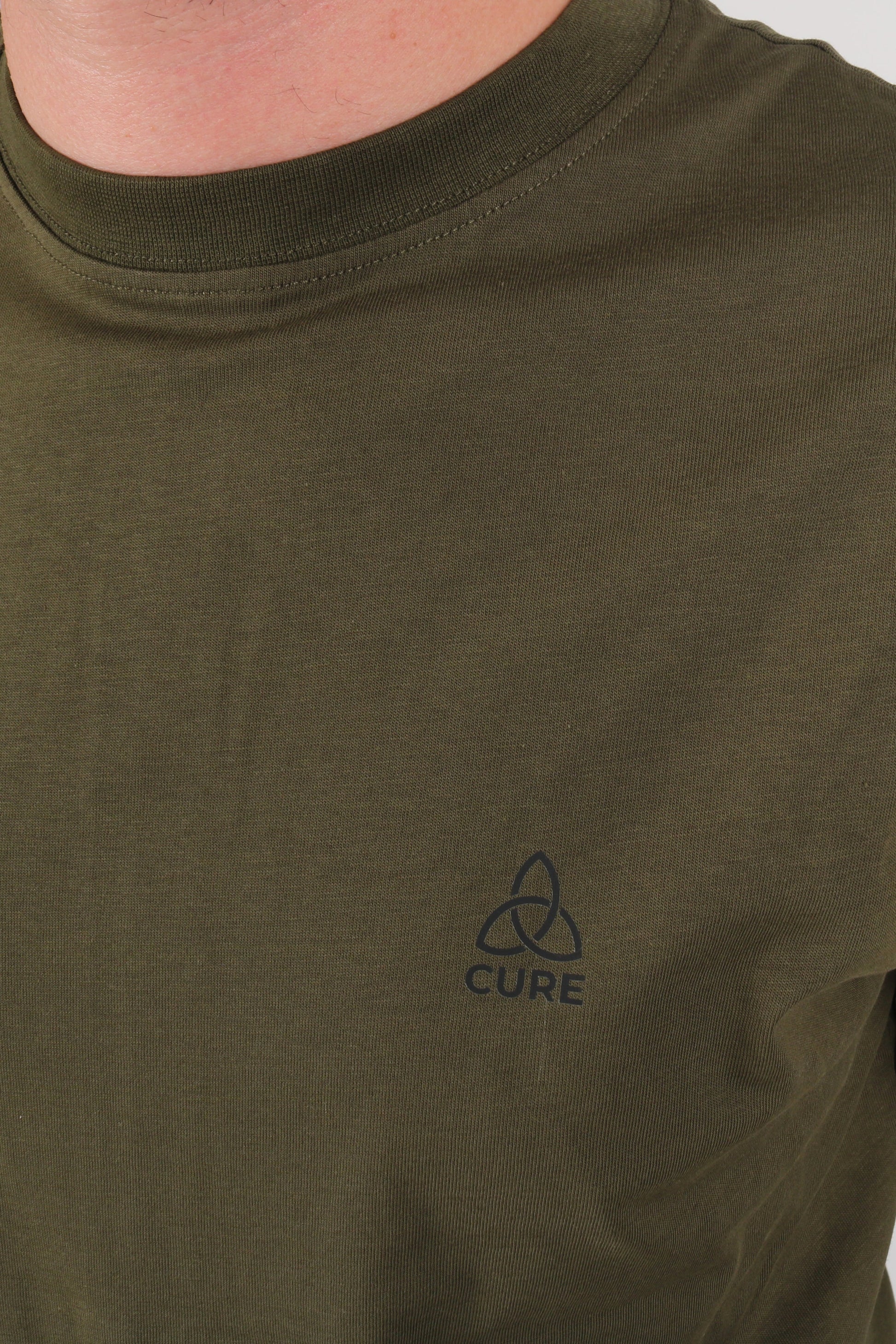 ComfortCure Alzheimer bakım tulumu haki renk yuvarlak yaka ve pamuk kumaş detayı